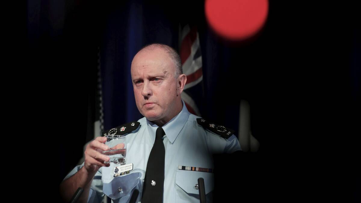 Acting Australian Federal Police commissioner Neil Gaughan fields questions over the raids. Picture: Alex Ellinghausen