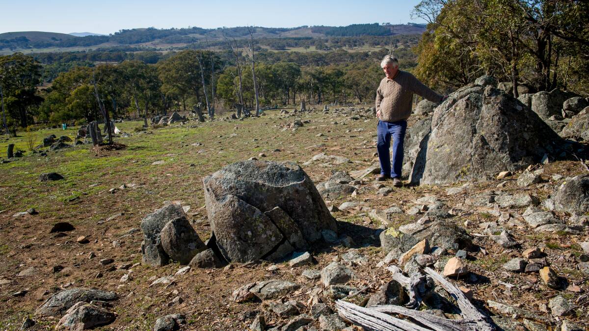 Mr Watson looking at the quarry site, which also served as a vantage point for Aboriginal people. Picture: Elesa Kurtz