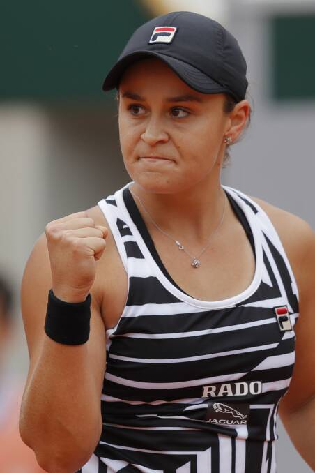 Barty clenches her fist after scoring a point against Amanda Anisimova during their semifinal match. Picture: AP