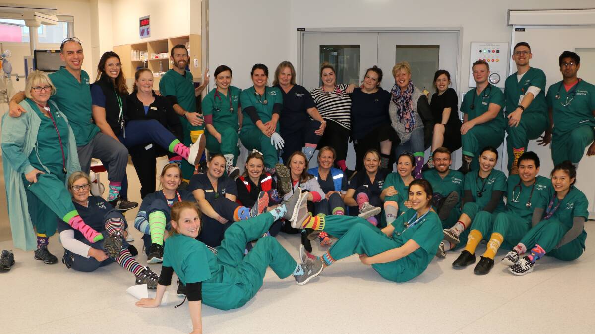 The staff in the emergency department at the Canberra Hospital with their crazy socks.