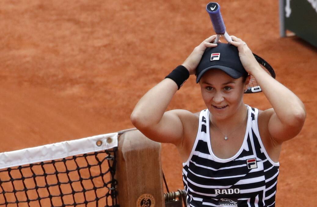 Asheligh Barty looks on in disbelief after winning her first major title at the French Open on Sunday (AEST). Picture: AP