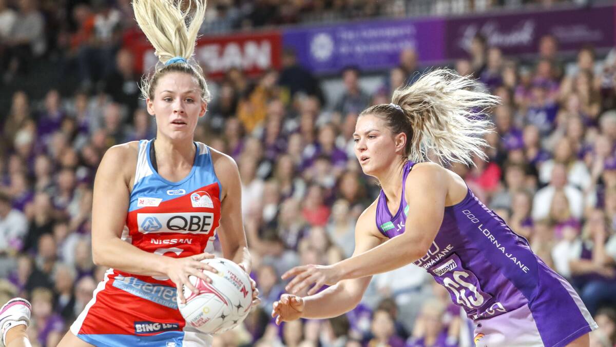 The Swifts' Sophie Halpin and Firebirds' Lenize Potgieter contest the ball. Picture: AAP