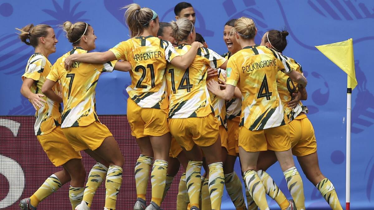 Matildas celebrate after Sam Kerr scores her first goal at the Women's World Cup. Picture: Francisco Seco