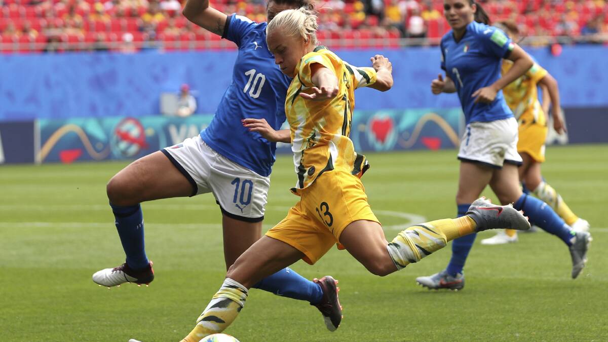 Cristiana Girelli challenges Australian midfielder Tameka Yallop. Picture: Francisco Seco