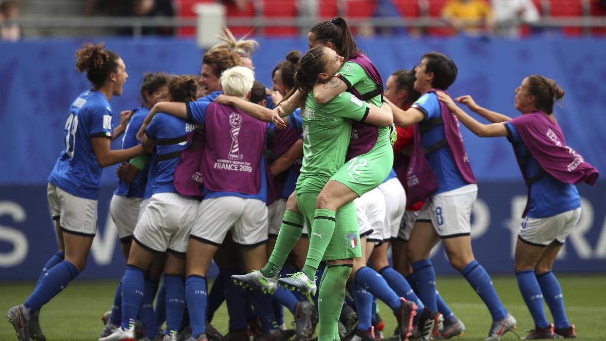 Italy celebrates after its last-minute winner against Australia. Picture: AP
