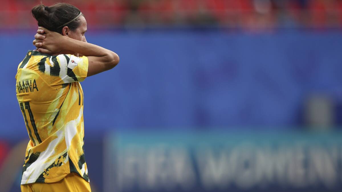 Australia's Lisa De Vanna holds her head after the loss. Picture: AP