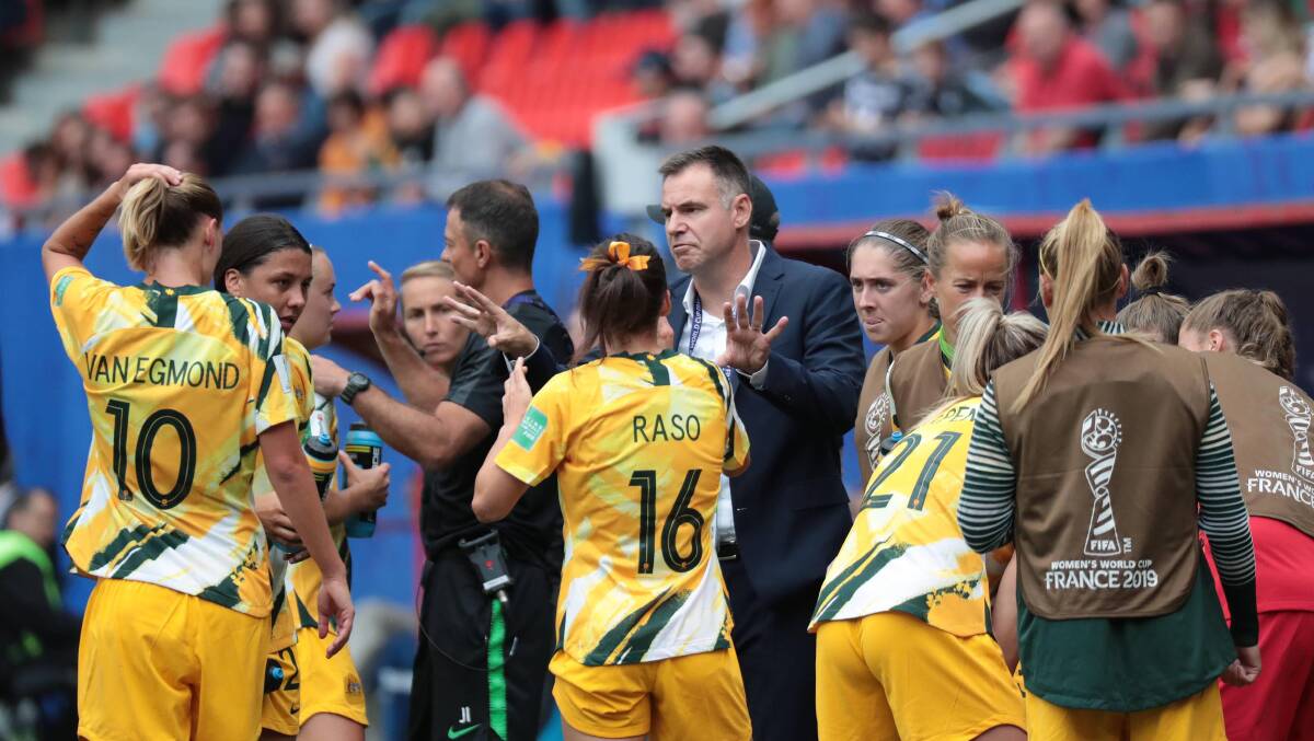Australia head coach Ante Milicic talks to his players on the sidelines during the Matildas' match against Italy. Picture: Frederic Mons/Presse Sports