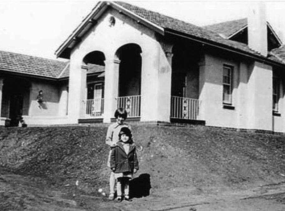 Dawn Waterhouse (front) with her sister Del outside their family's new house on May 9, 1927, the day Old Parliament House opened in Canberra. Photo: ACT Historic Places