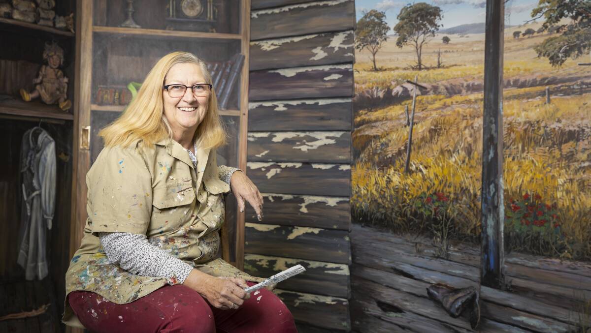 Artist Margaret Hadfield with her mural 'On the Sheep's Back', which was commissioned for the Ballarat Biennale of Australian Art. Picture: Sitthixay Ditthavong