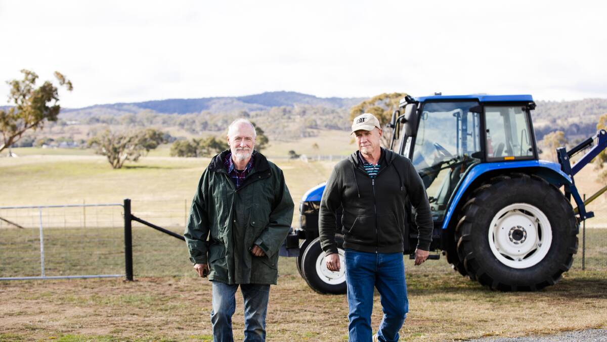 Brothers, Peter (left) and Paul Cartwright are proposing part of their family's land to be sold and developed to effectively double the size of Sutton. Picture: Jamila Toderas