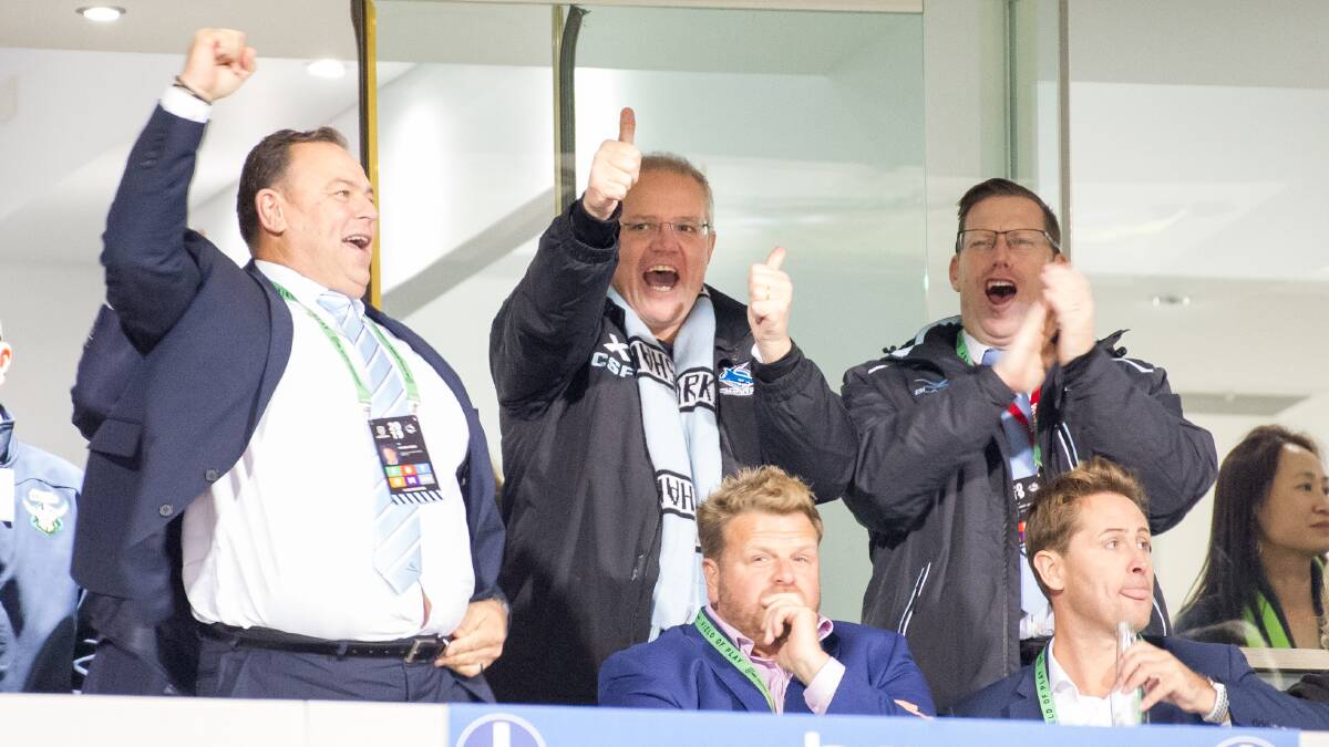 Prime Minister Scott Morrison cheering on the Sharks. Picture: Elesa Kurtz