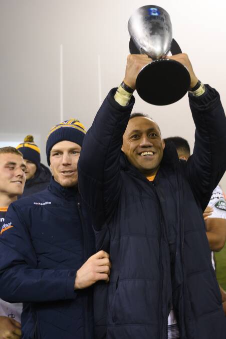 Christian Lealiifano, right, with David Pocock and the Australian conference trophy. Picture: AAP