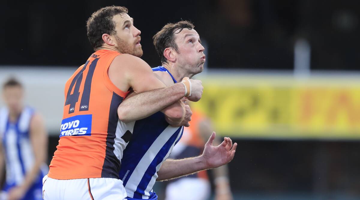 Shane Mumford of the Giants (left) and Todd Goldstein of the Kangaroos. Picture: AAP