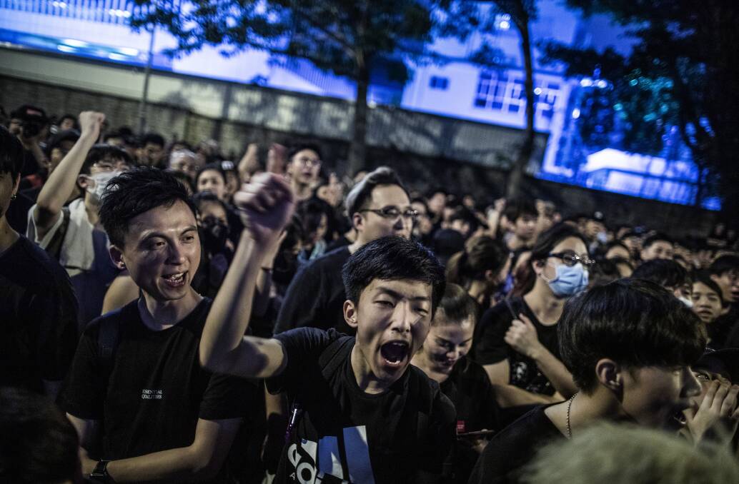 Protesters in Hong Kong chant outside of the Office of the Chief Executive. Picture: Bloomberg