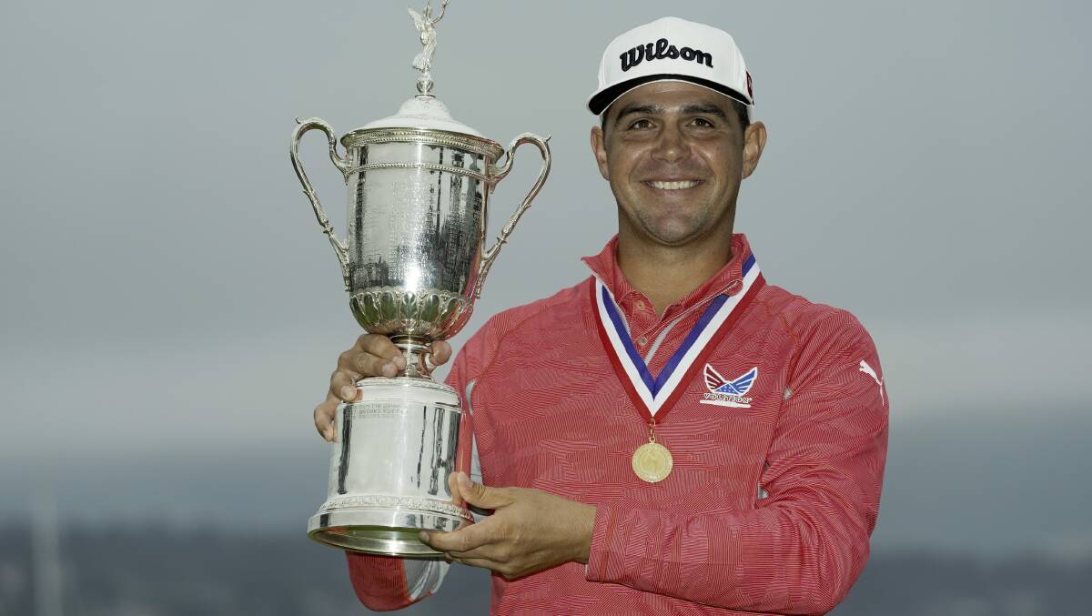 Gary Woodland posses with the trophy after winning the US Open. Picture: AP
