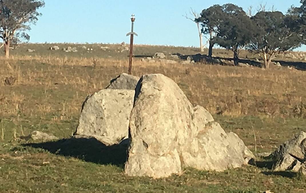 Arthurian legend comes to a Gunning paddock with this hand-made Excalibur sticking out of a boulder. Picture: Gary Poile