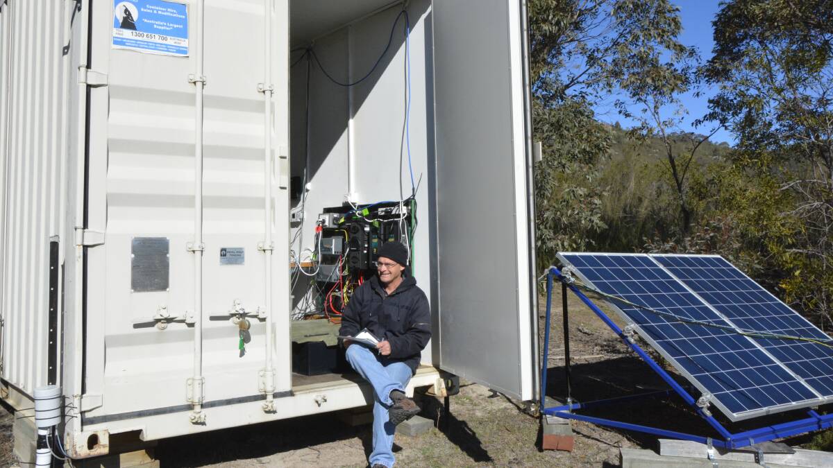 Dr John Taylor in his shipping container office, the nerve centre for the acoustic wind profiler in Tidbinbilla Nature Reserve. Picture: Tim the Yowie Man