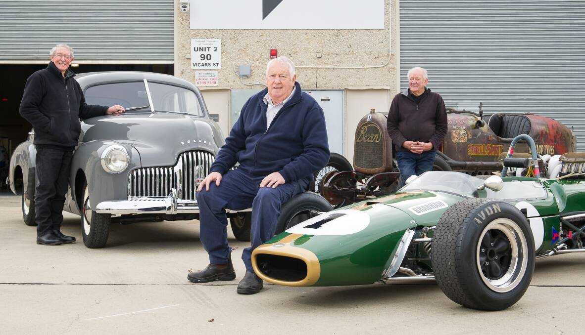 At a secure workshop hidden away in Canberra, Ken Houlahan, Ian Stewart and Colin Ogilvie are carefully protecting precious elements of Australia's motoring heritage. Picture: Elesa Kurtz