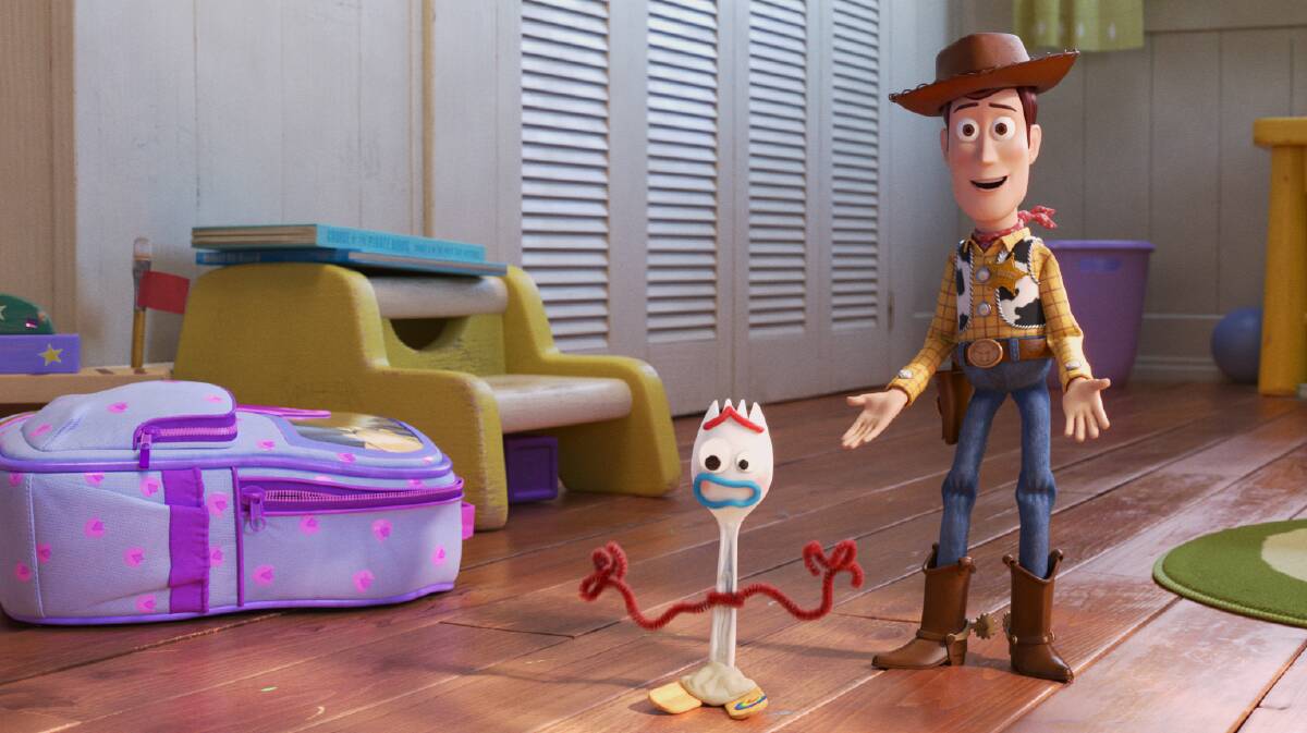 New toy Forky (left, voiced by Tony Hale) and old favourite Woody (Tom Hanks) in Toy Story 4. Picture: Disney/Pixar