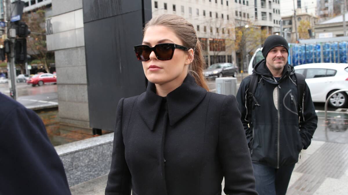 Belle Gibson arrives at the Federal Court in Melbourne on Thursday to face court over failure to pay a $410,000 penalty. Picture: AAP