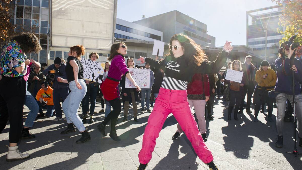 Protesters dance to one of the performing acts at the "protest jam" on Friday. Picture: Dion Georgopoulos