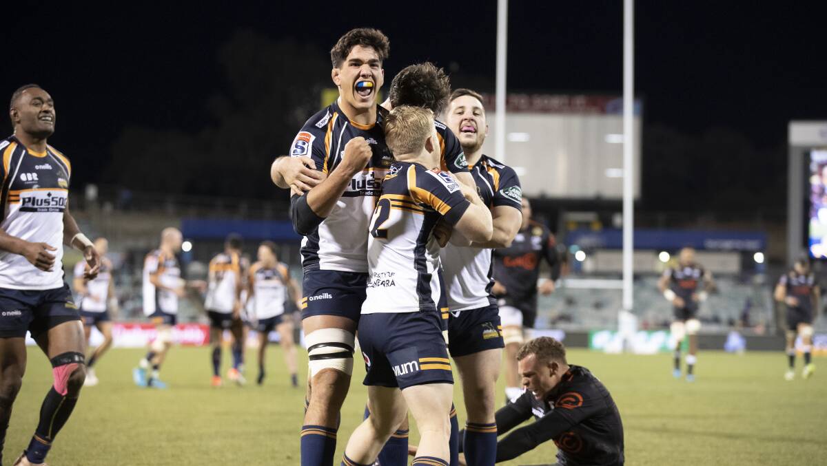 Brumbies players celebrate after Matt Lucas scored a try in the dying stages of the Super Rugby quarter final against the Sharks. Picture: Sitthixay Ditthavong