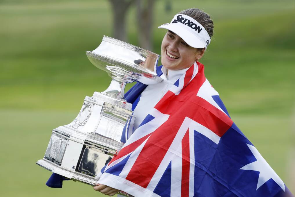 Hannah Green, of Australia, holds the trophy after winning the KPMG Women's PGA Championship golf tournament. Picture: AP
