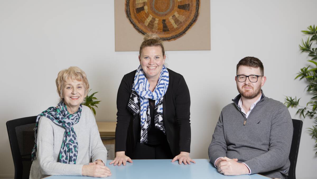Conflict Resolution Service CEO Mel Haley, centre, with family support practitioners Janine Brissett and Hamish Guthrie. Picture: Jamila Toderas