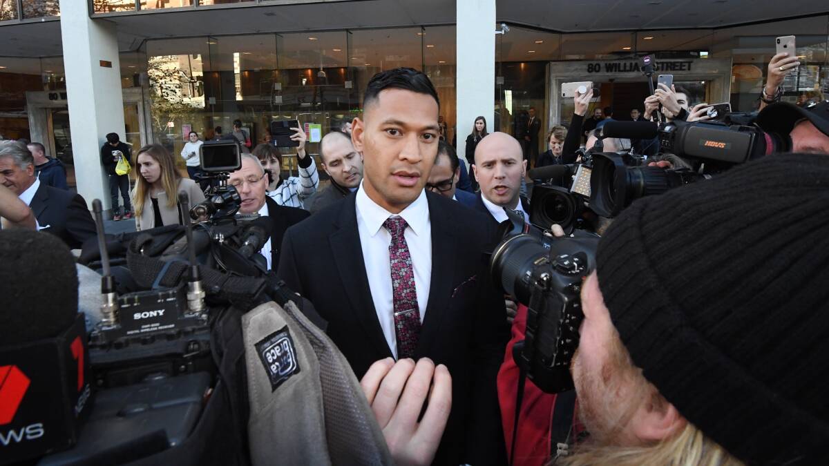 Israel Folau (centre) leaves a conciliation hearing at the Fair Work Commission in Sydney on June 28. Picture: Peter Rae/AAP Image