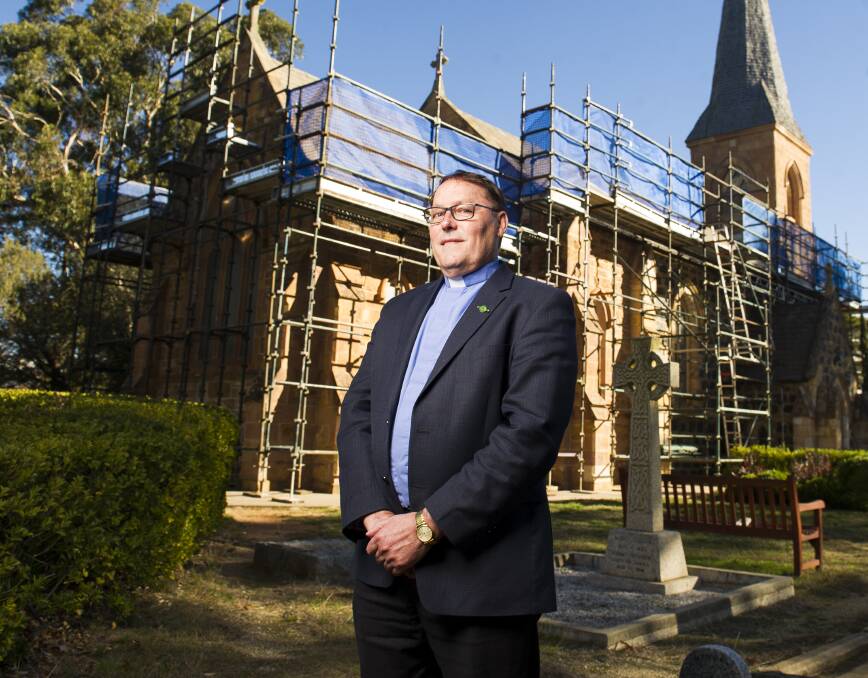 The Reverend Paul Black at St John's Church as the work on the roof starts. Picture: Dion Georgopoulos