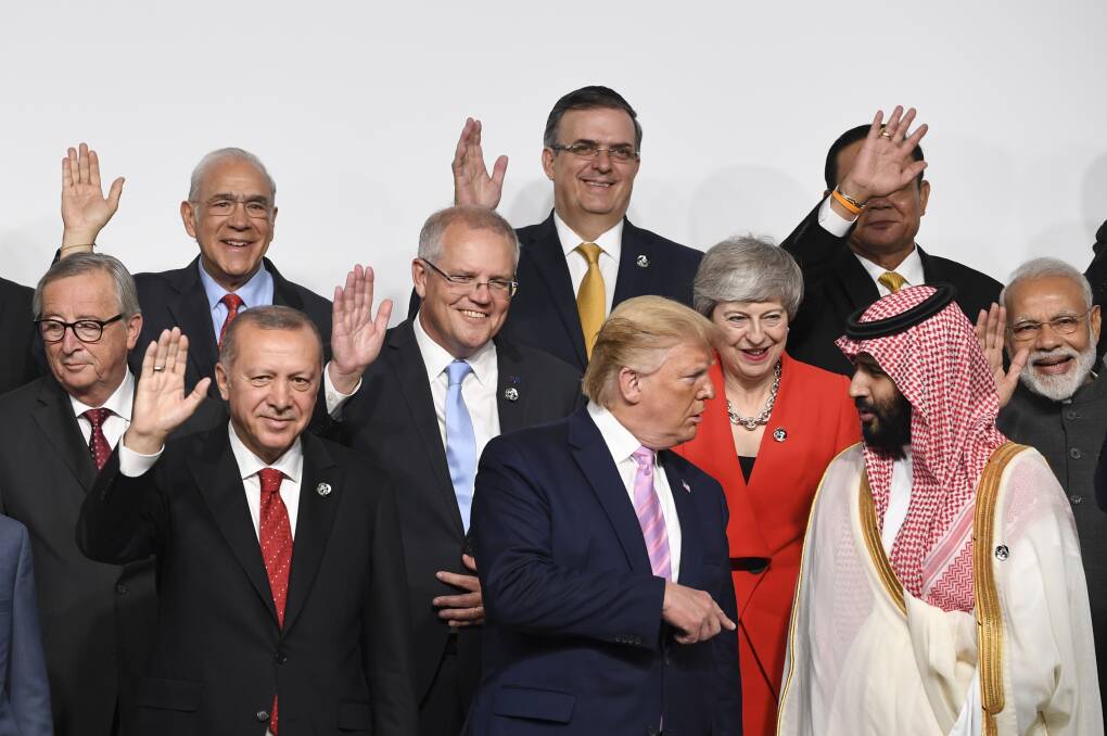 World leaders gather for the family photo at the G20 summit in Osaka, Japan. Picture: AAP
