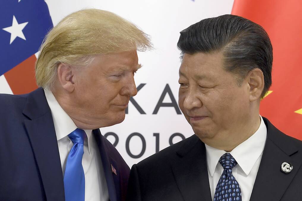 President Donald Trump, left, meets with Chinese President Xi Jinping at the G-20 summit in Osaka, Japan. Picture: AP