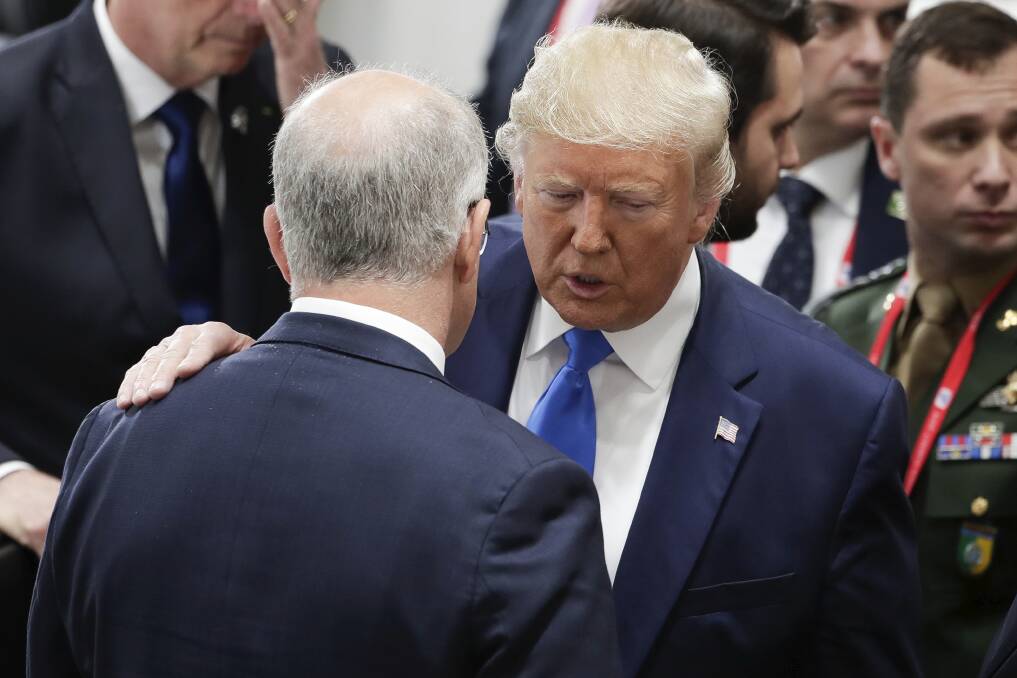 Prime Minister Scott Morrison and US President Donald Trump at the G20 Summit in Osaka. Much of Australia's defence policy relies on American support. Picture: Alex Ellinghausen