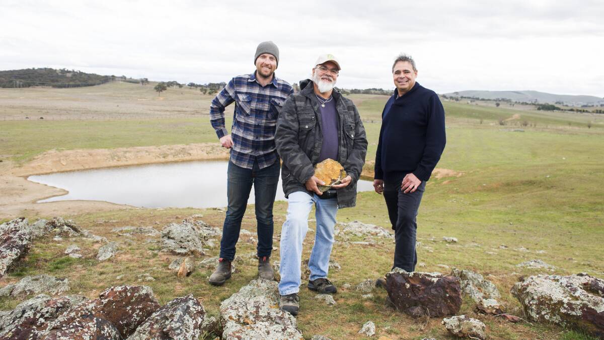 Farmer Sam Vincent, Ngunnawal elder Wally Bell and archaeologist Dave Johnston at the site of an Aboriginal ochre quarry at Gollion Farm near Sutton, where the Vincent family has farmed since 1983. Picture: Dion Georgopoulos