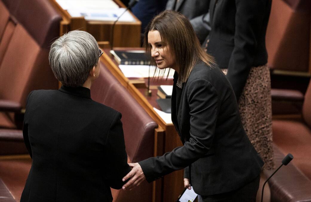 Senator Penny Wong and Senator Jacqui Lambie during the opening of Parliament this week. Picture: Dominic Lorrimer