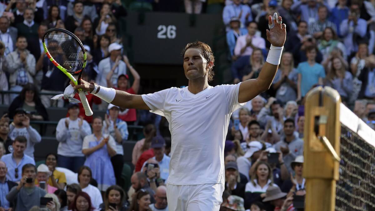 Spain's Rafael Nadal celebrates after beating Japan's Sugita Yuichi in a singles match at Wimbledon. Picture: AP