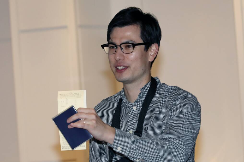 Australian student Alek Sigley gestures was released by North Korea after a week in detention. Picture: AP