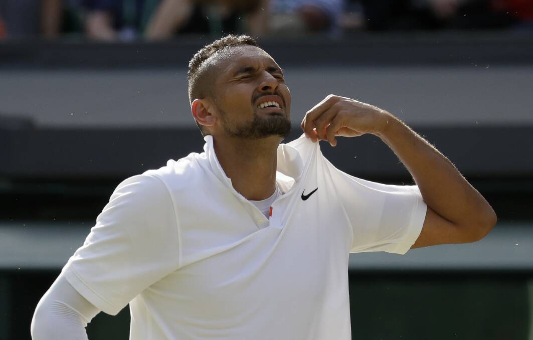 Australia's Nick Kyrgios reacts after losing a point against Spain's Rafael Nadal. Picture: AP