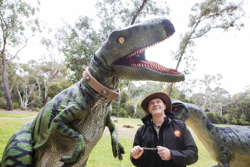 General manager of the National Dinosaur Museum David Barker and Delta the Velociraptor. Picture: Jamila Toderas