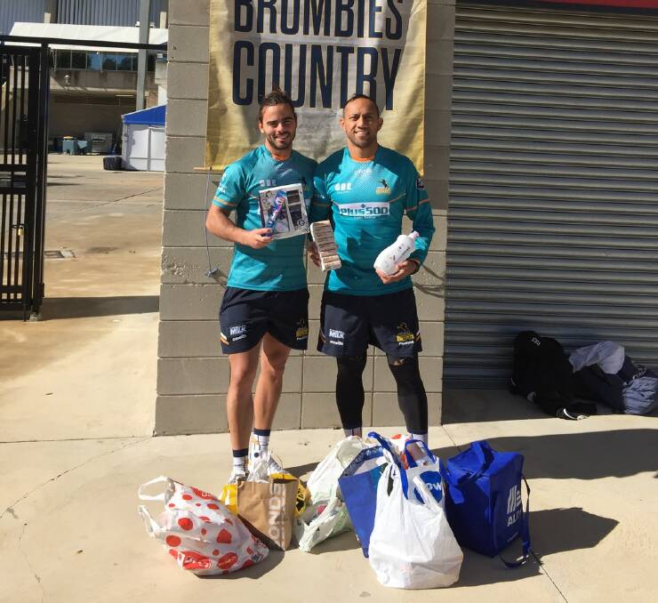 ACT Brumbies Christian Lealiifano and Andy Muirhead are domestic violence crisis service champions.
