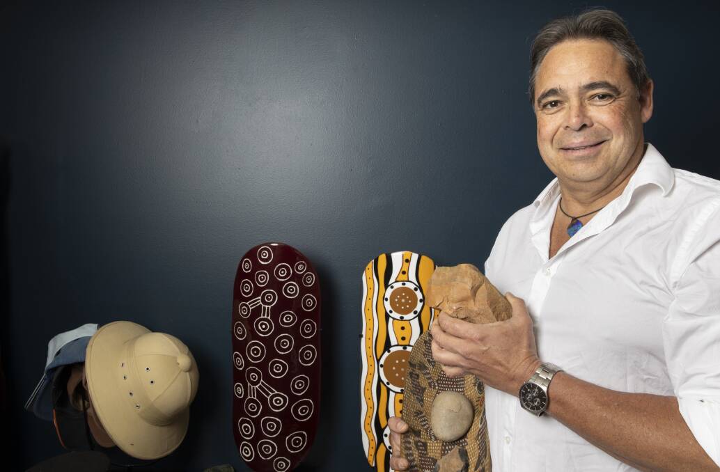 Archaeologist Dave Johnston with some Aboriginal artefacts. Picture: Sitthixay Ditthavong