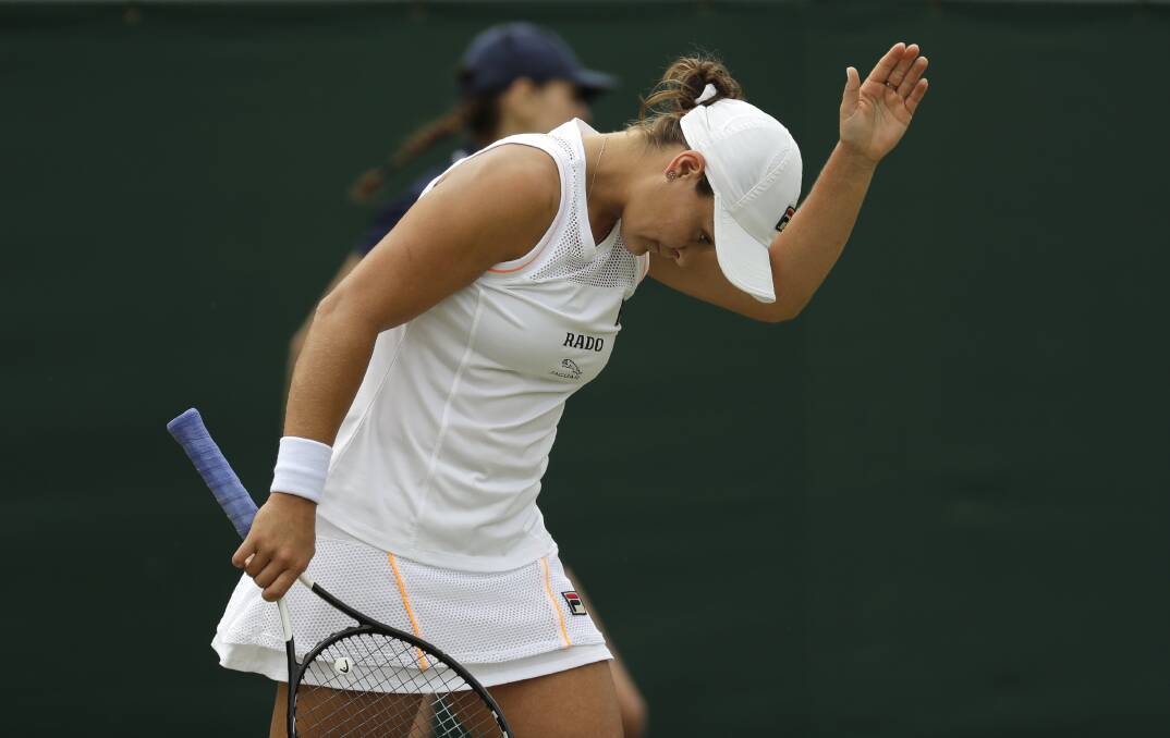 Australia's Ashleigh Barty shows her frustration during her quarter-final loss to Alison Riske. Picture: AP