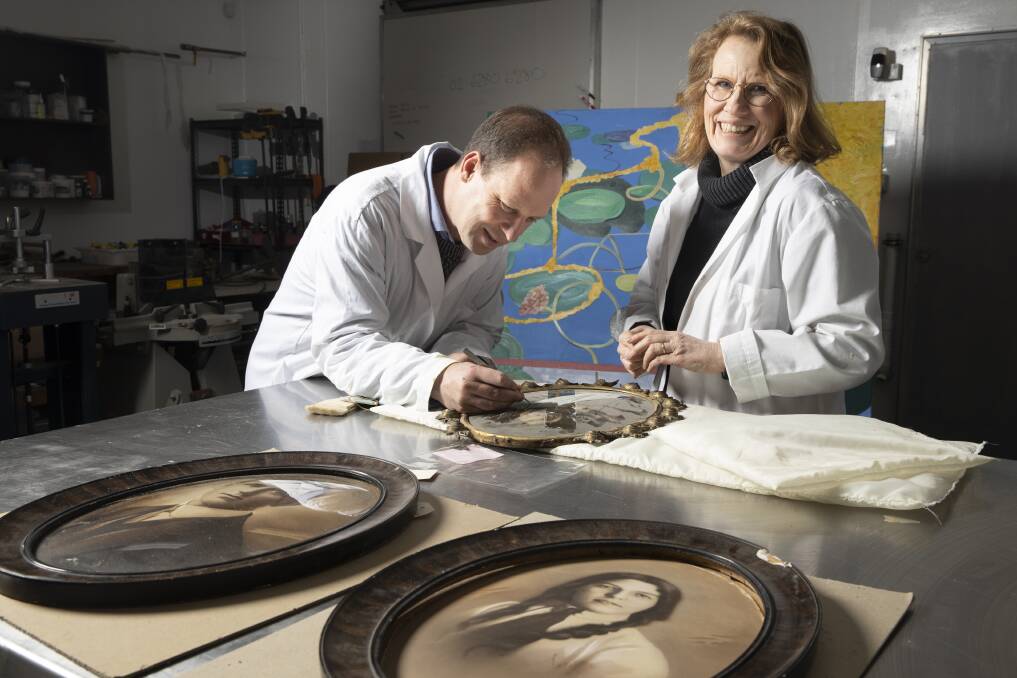 Senior objects conservator Andrew Pearce and senior textiles conservator Victoria Pearce. Picture: Sitthixay Ditthavong