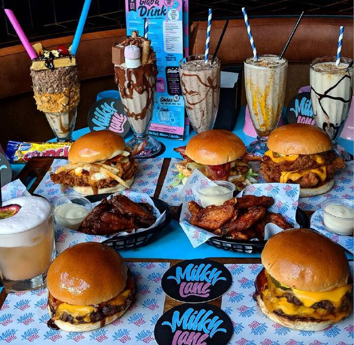 With a menu of over-the-top desserts, cocktails and burgers, Milky Lane is all set to a backdrop of hip hop and graffiti. Picture: Supplied