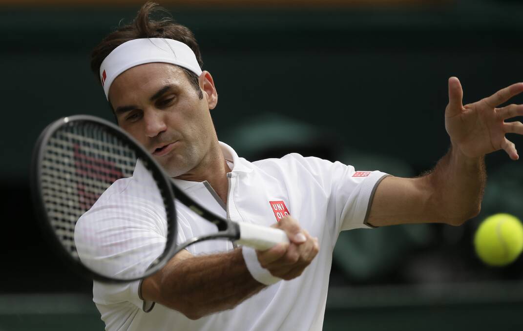 Roger Federer returns the ball to Japan's Kei Nishikori during their quarter-final match. Picture: AP