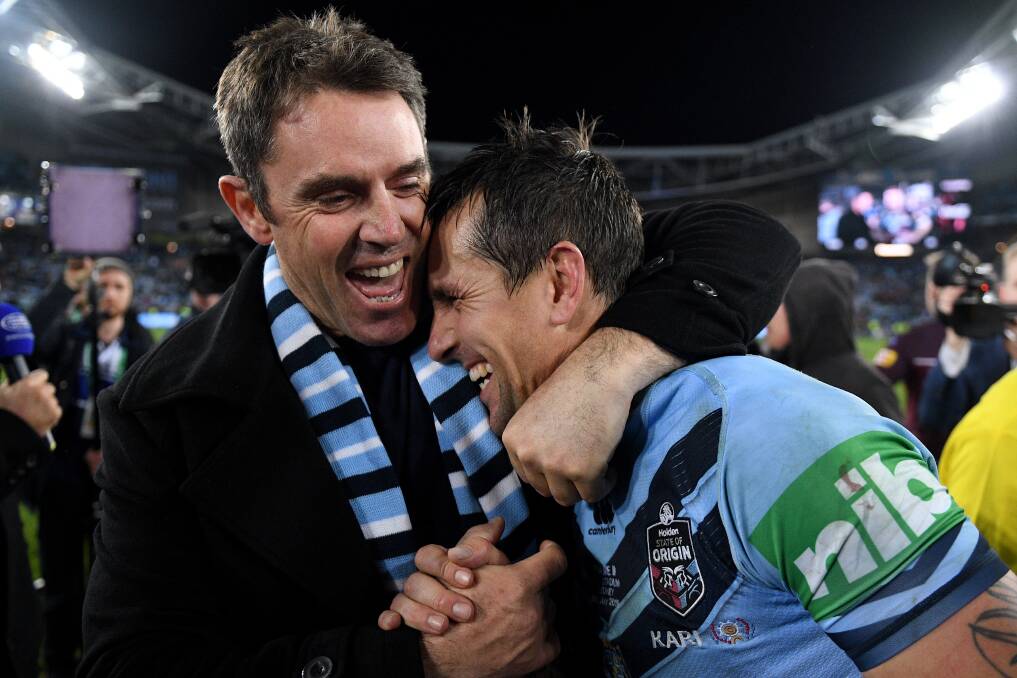 NSW Blues coach Brad Fittler celebrates with Mitchell Pearce following their win. Picture: AAP