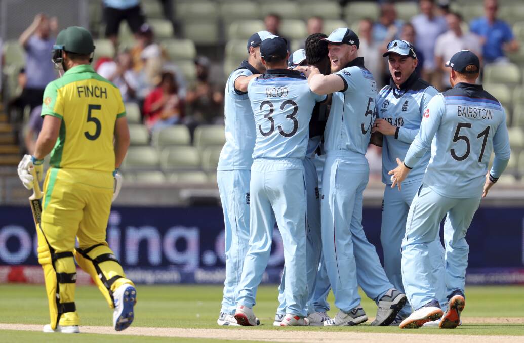 England players celebrate the wicket of Australia's captain Aaron Finch. Picture: AP