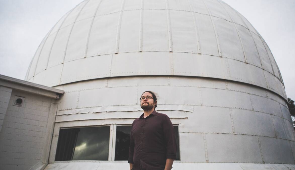 ANU astrophysicist Brad Tucker, pictured at Mount Stromlo Observatory, said Australia's first space agency was "never going to be NASA". Picture: Jamila Toderas