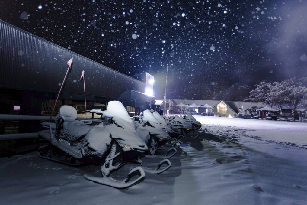 Snow coats snowmobiles at Thredbo apline ski resort. Picture: Supplied