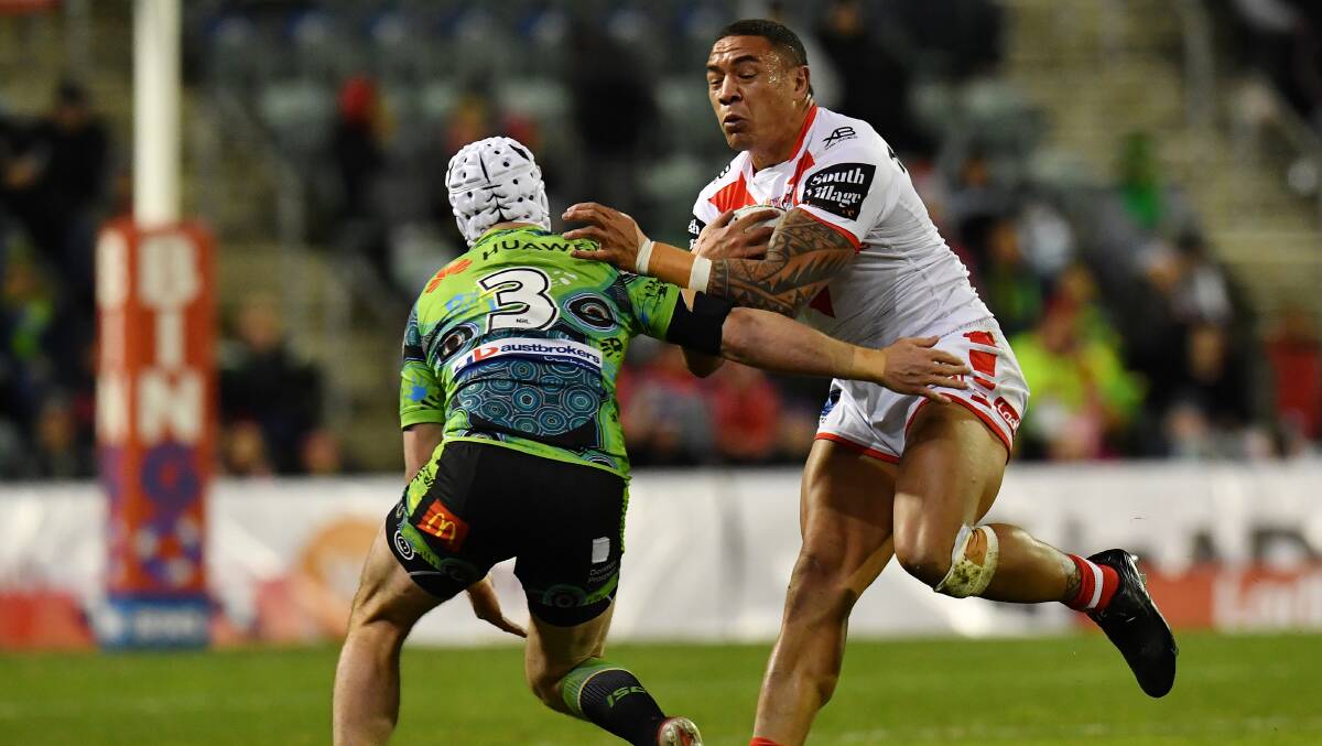 Jarrod Croker of the Raiders (left) puts a hit on St George forward Tyson Frizell. Picture: AAP Image/Dean Lewins